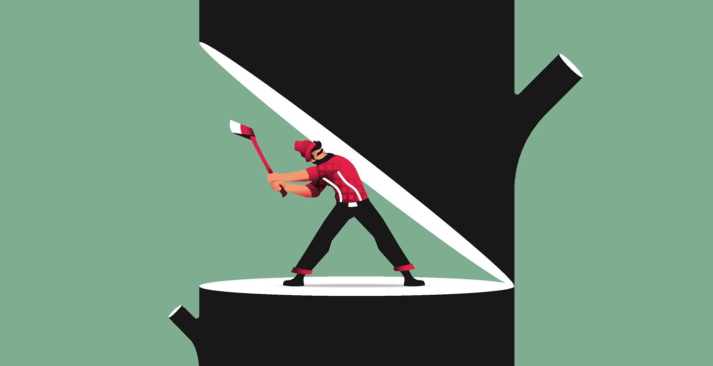 Lumberjack chopping a tree that is going to fall on him.