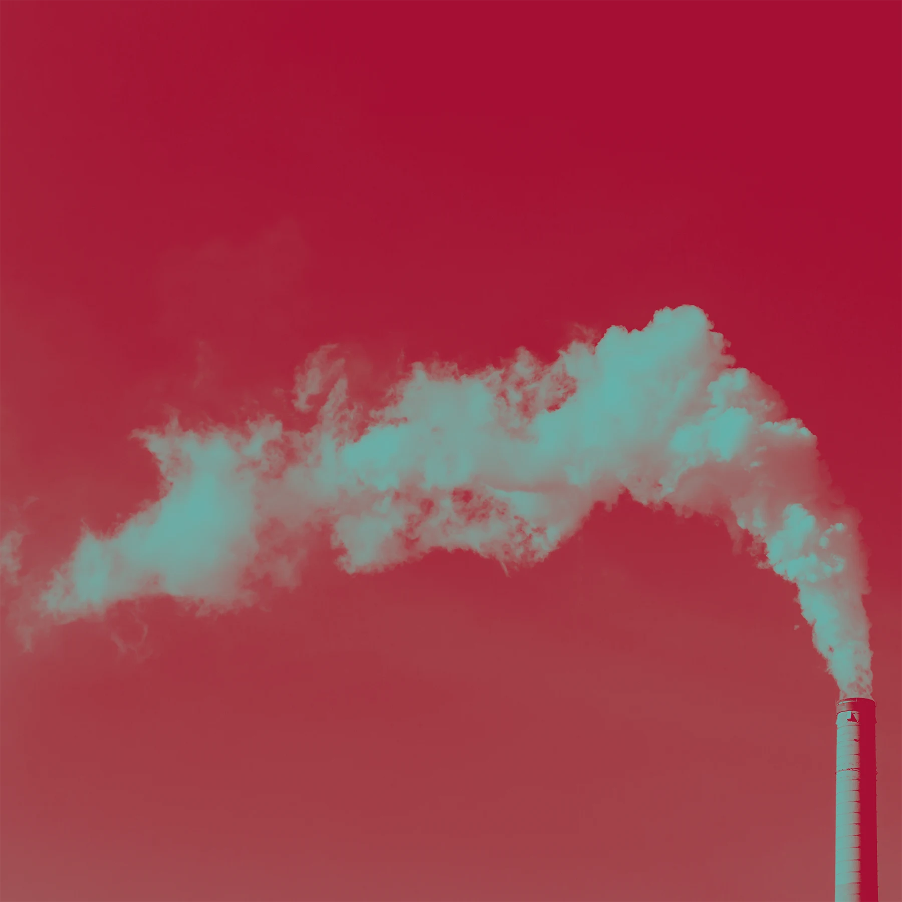 A single industrial smokestack is the far right of the image. Teal-tinted smoke comes out of it in a plume that drifts horizontally across the frame. The sky behind it is a deep red hue.